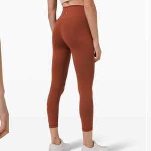Lulemon Wunder Train HR Crop 23” in dark orange terracotta